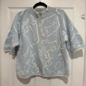 Vintage women’s light blue Illustrations hand-knit sweater